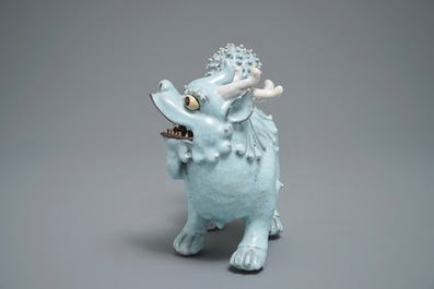 A Chinese Shiwan glazed pottery model of a qilin, 19/20th C.