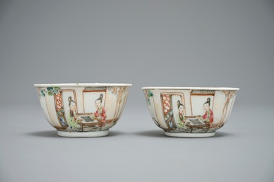 A pair of fine Chinese famille rose cups and saucers with figures in a garden, Yongzheng/Qianlong