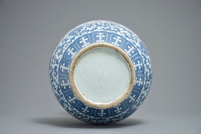 A Chinese blue and white lotus scroll hu vase, 19th C.