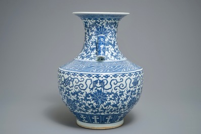 A Chinese blue and white lotus scroll hu vase, 19th C.