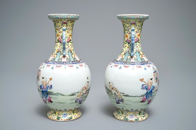 A pair of Chinese famille rose vases with playing boys, Qianlong mark, Republic, 20th C.