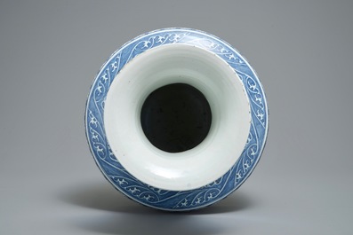 A Chinese blue and white lotus scroll hu vase, 19th C.