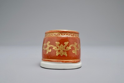 A Chinese coral-ground and gilt miniature shoe with hidden famille rose erotical design, 19/20th C.