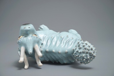 A Chinese Shiwan glazed pottery model of a qilin, 19/20th C.