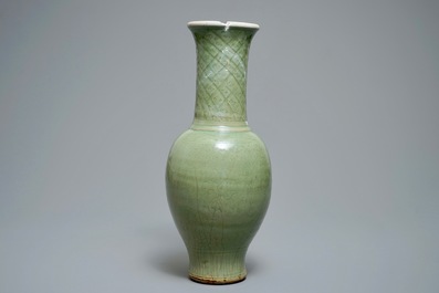 A tall Chinese Longquan celadon vase with underglaze design, Song or Ming