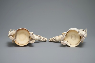 A pair of Chinese ivory models of fire spitting qilin, 19th C.