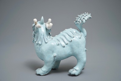 A Chinese Shiwan glazed pottery model of a qilin, 19/20th C.