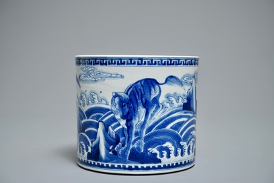 A Chinese blue and white cylindrical brush pot or bitong with mythical beasts, Kangxi