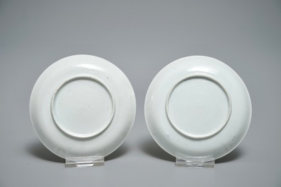 A pair of Chinese eggshell cups and saucers with overglaze blue and gilt floral design, Yongzheng