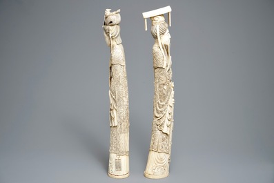 A pair of large Chinese ivory figures of an emperor and his wife, 19th C.