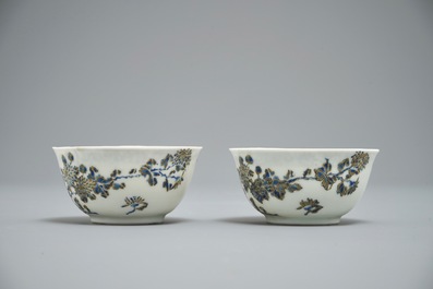 A pair of Chinese eggshell cups and saucers with overglaze blue and gilt floral design, Yongzheng