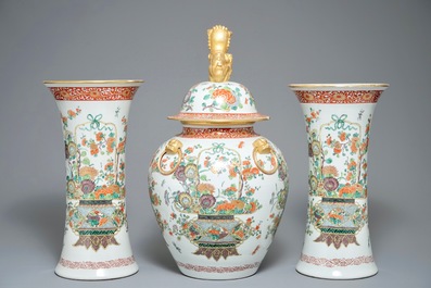 A famille verte-style three-piece garniture with fine flower baskets, Samson, Paris, 19th C.
