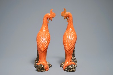 A pair of Chinese coral-ground models of phoenixes, 19/20th C.