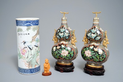 A Chinese qianjiang cai hat stand, a pair of cloisonn&eacute; vases and a carved wood figure, 20th C.