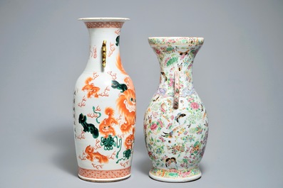 A tall Chinese iron red vase with Buddhist lions and a Canton famille rose vase, 19th C.