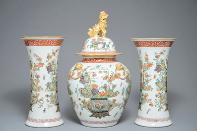 A famille verte-style three-piece garniture with fine flower baskets, Samson, Paris, 19th C.