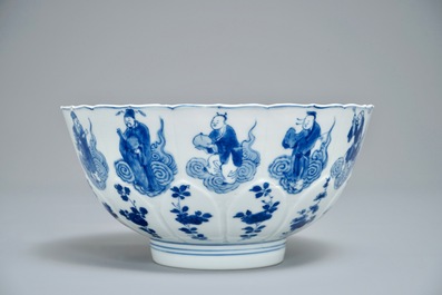 A Chinese blue and white moulded bowl with immortals, Chenghua mark, Kangxi