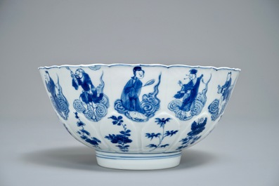 A Chinese blue and white moulded bowl with immortals, Chenghua mark, Kangxi