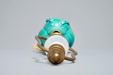 A Chinese turquoise-glazed three-spouted vase with bronze lamp mounts, 19th C.