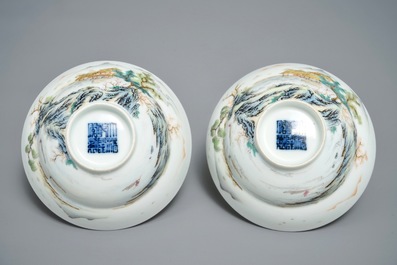 A pair of Chinese famille rose tea bowls with a landscape, Qianlong mark, 20th C.