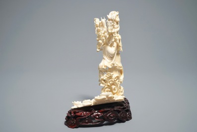 A Chinese carved ivory figure of Lan Cai He, 1st half 20th C.