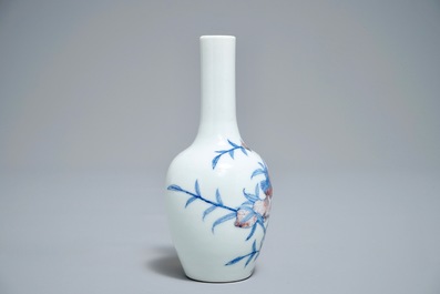 A Chinese blue and underglaze red 'sanduo' vase, Kangxi mark, 19/20th C.