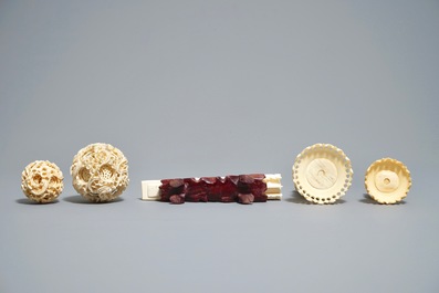 A Chinese carved ivory model of a junk and two Canton puzzle balls, 19/20th C.