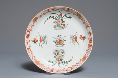 Three Chinese famille verte plates with carps and floral designs, Kangxi