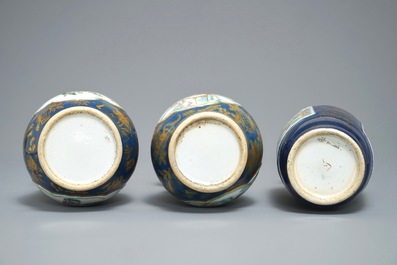Three Chinese famille verte on gilt blue-ground vases, 19th C.