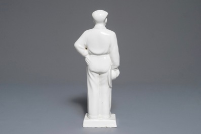 A Chinese figure of Mao Zedong holding a hat, 2nd half 20th C.