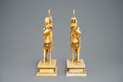 A pair of large Chinese inlaid ivory models of warriors on horseback, 19th C.