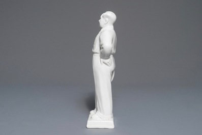 A Chinese figure of Mao Zedong holding a hat, 2nd half 20th C.