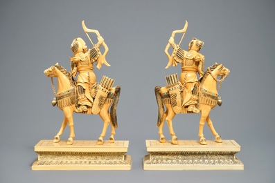 A pair of large Chinese inlaid ivory models of warriors on horseback, 19th C.