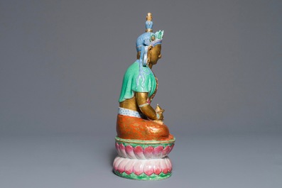 A Chinese parcel-gilt famille rose model of Buddha, 19th C.