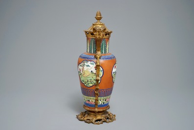 Een Chinese ge&euml;mailleerde Yixing vaas met vergulde bronsmontuur, 19e eeuw