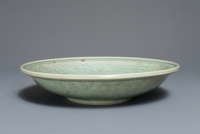 A Chinese qingbai charger with underglaze floral design, Ming