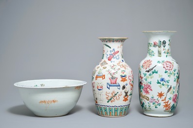 Two Chinese famille rose vases and a large deep bowl, 19th C.