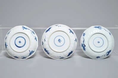 Twelve Chinese blue and white cups and saucers with floral design, Kangxi