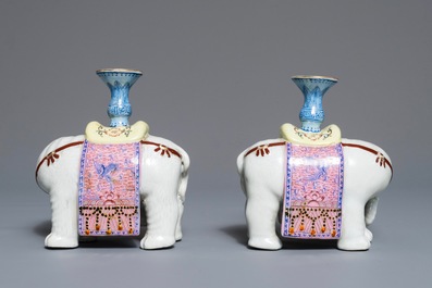 A pair of Chinese famille rose elephant-form candlesticks, 19th C.