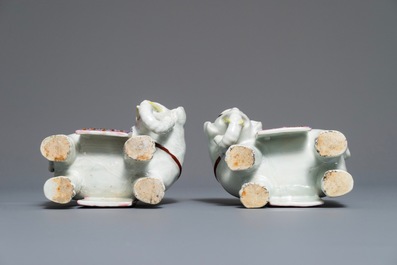 A pair of Chinese famille rose elephant-form candlesticks, 19th C.