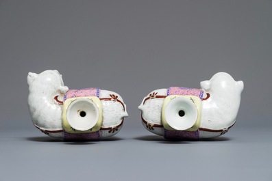 A pair of Chinese famille rose elephant-form candlesticks, 19th C.