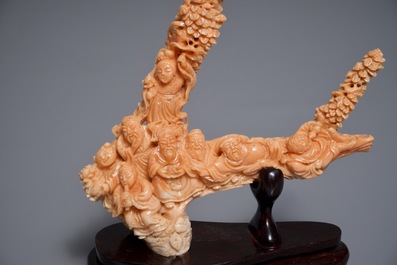 Two Chinese coral carvings on wooden stands, 19/20th C.