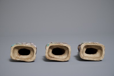 Three Chinese enamel on biscuit figures of Buddha, 19th C.