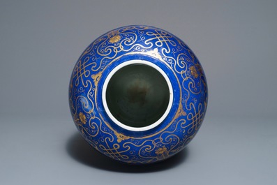 A large Chinese gilt-decorated blue-ground jar and cover, 19th C.