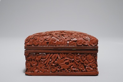 A Chinese ivory card case and a cinnabar lacquer box and cover, Qianlong mark, 19th C.