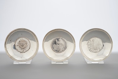 Nine Chinese silver coin bowls, mark of Wang Hing, 19/20th C.