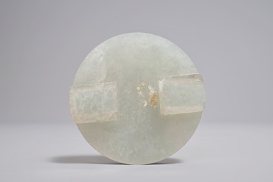 A Chinese green jade belt buckle, 19/20th C.