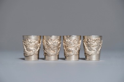 A Chinese silver liquor set on tray with applied dragon design, 19/20th C.