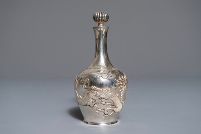 A Chinese silver liquor set on tray with applied dragon design, 19/20th C.