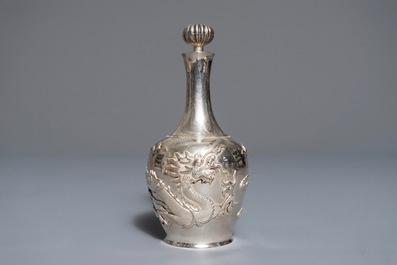 A Chinese silver liquor set on tray with applied dragon design, 19/20th C.